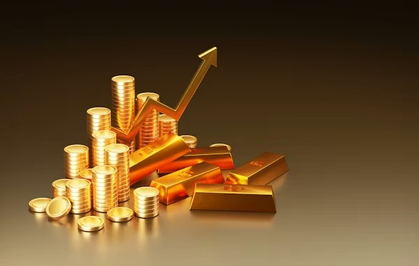 Gold coins and bars with a rising investment arrow